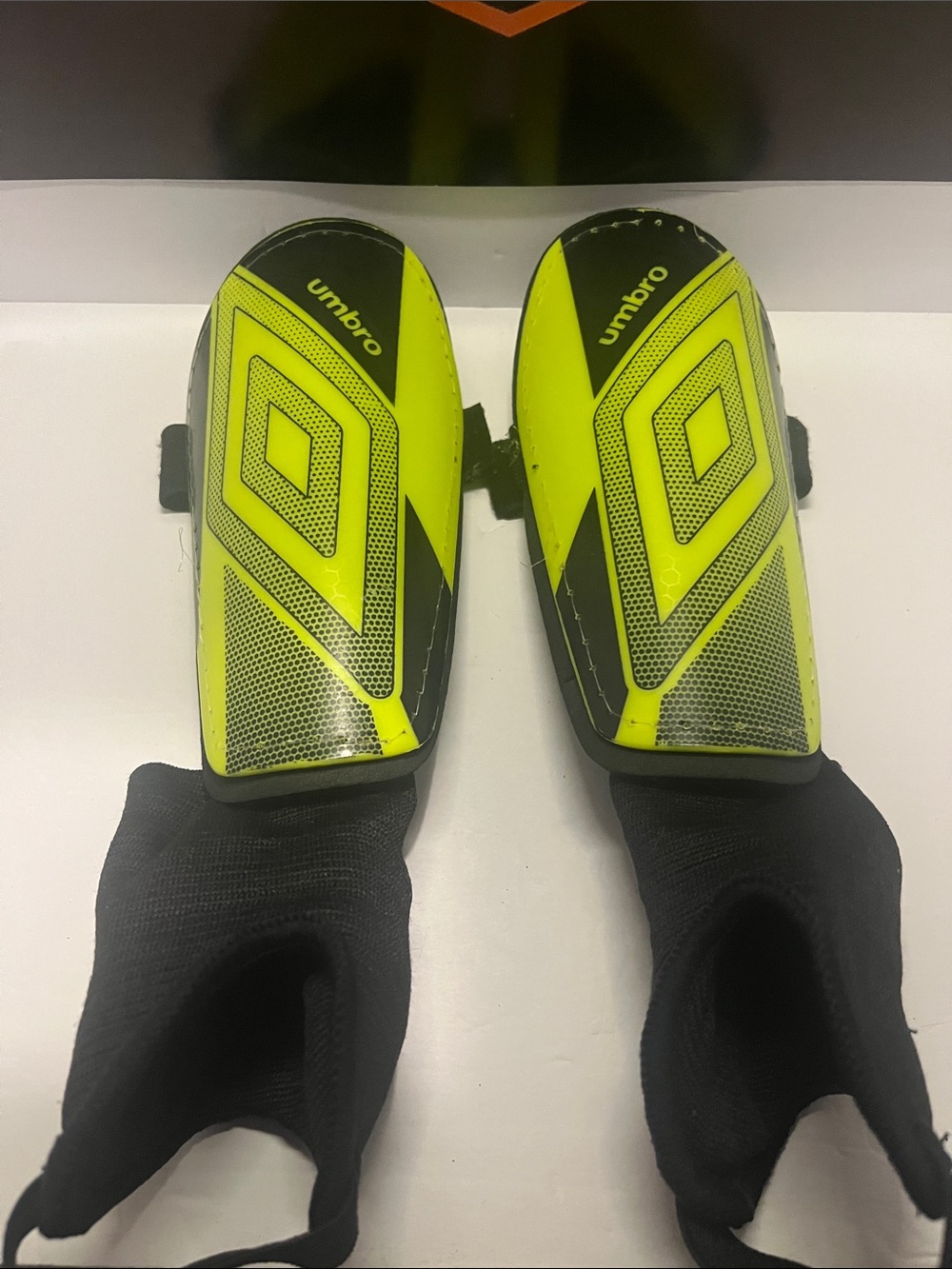 Umbro Neon Yellow and Black Protective Shin Guards